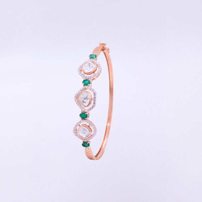 18KT Rose Gold Bracelet with Polki, Diamond and Oval Emeralds - Image 1